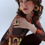 Woman wearing statement artisan jewelry
