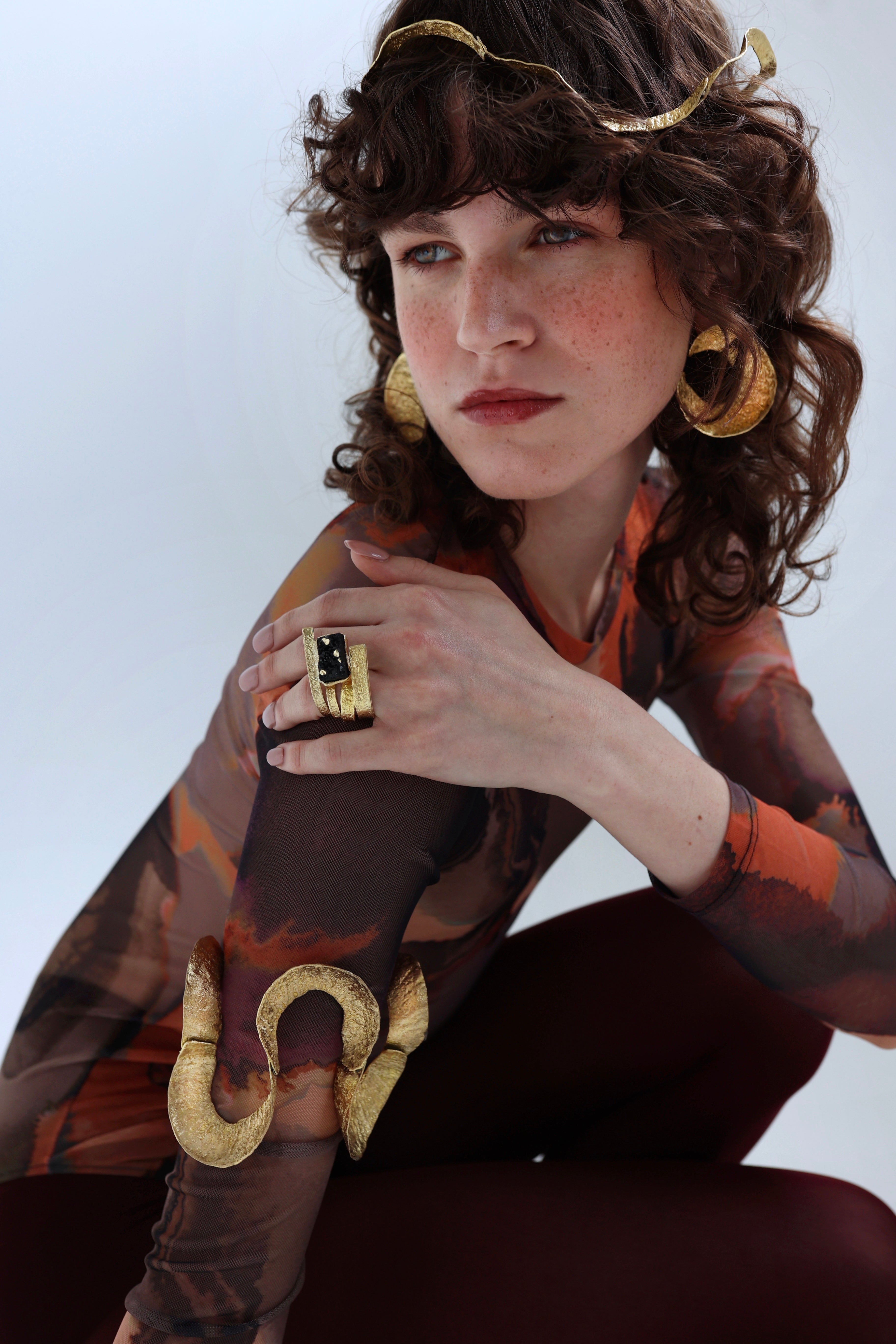 Woman wearing statement artisan jewelry